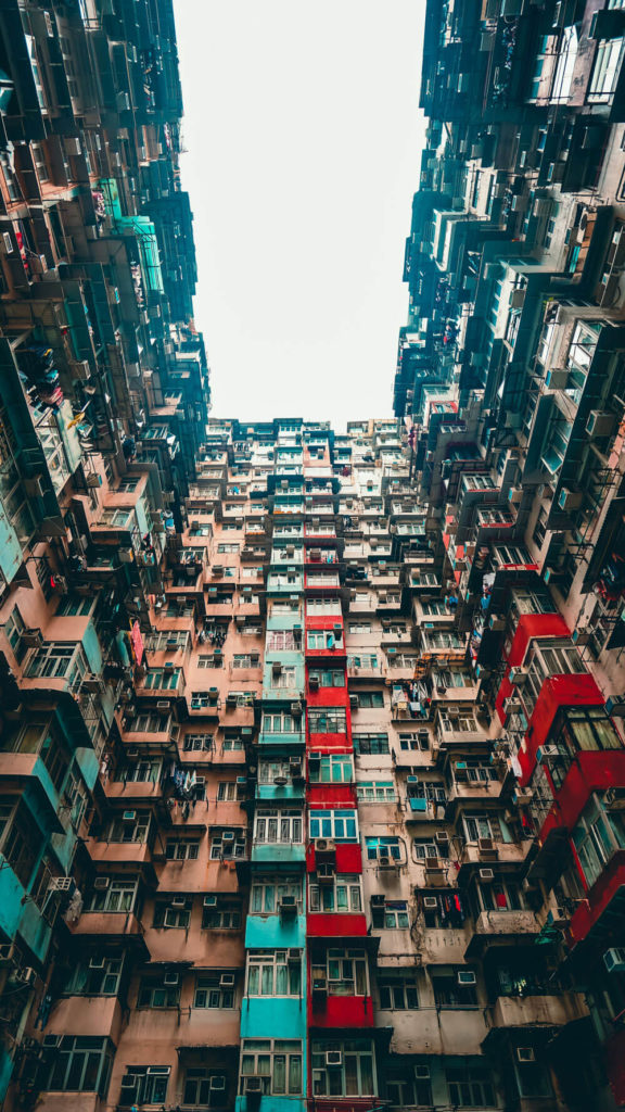 tall crowded building as representation of shared server